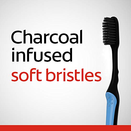 Floss-tip bristles sweeping along gum line and hard-to-reach areas