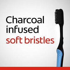 Floss-tip bristles sweeping along gum line and hard-to-reach areas