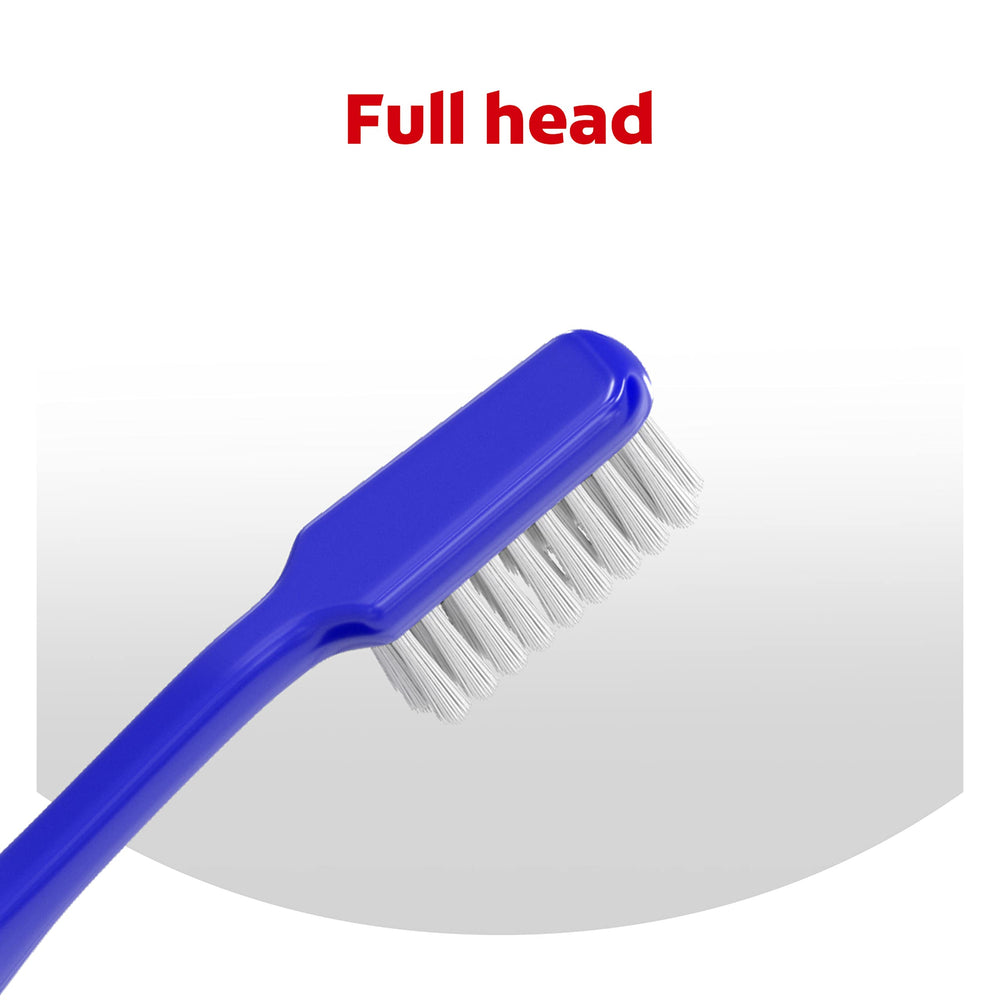 Close-up of cellophane-wrapped Colgate toothbrushes