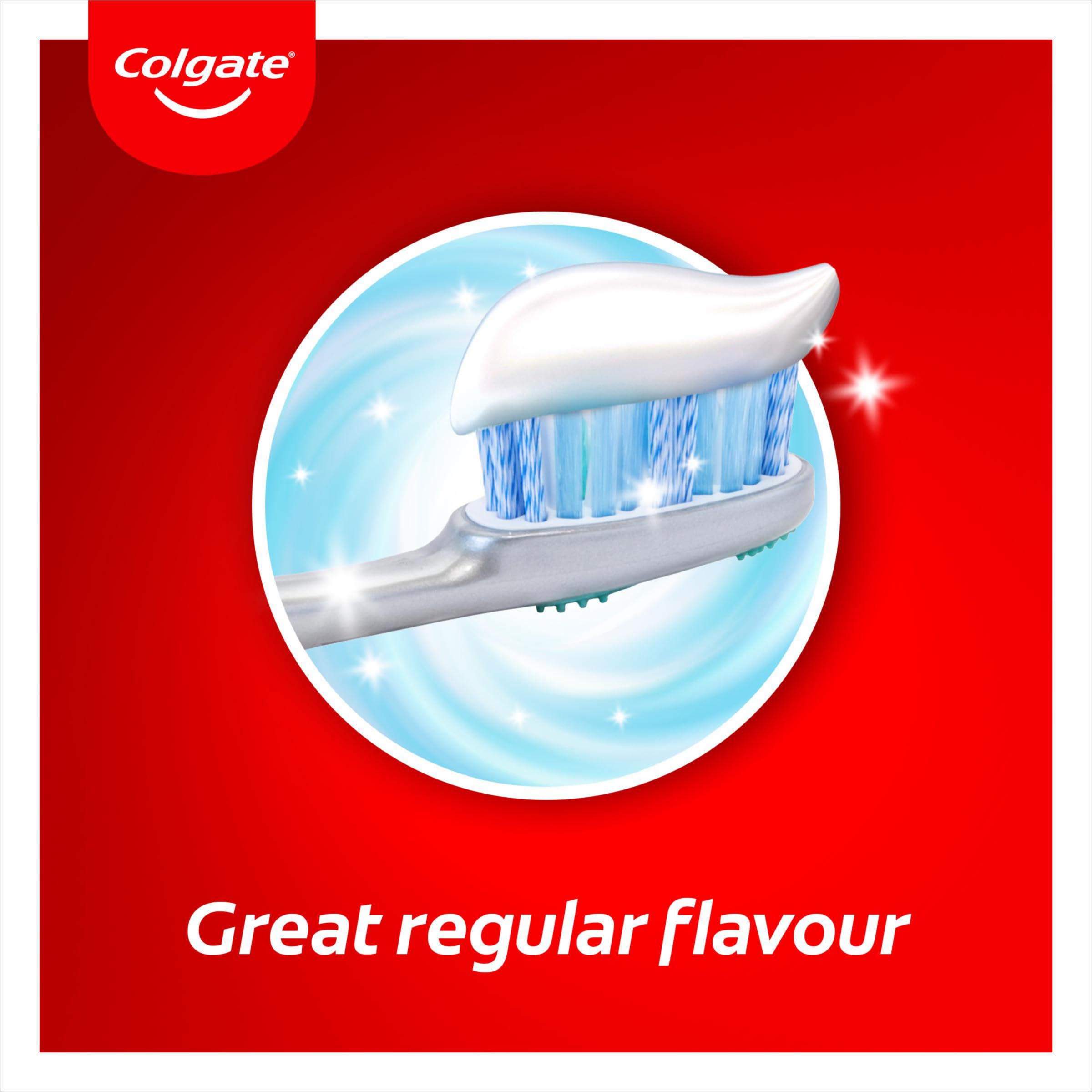 Toothbrush with Colgate toothpaste showing plaque removal concept