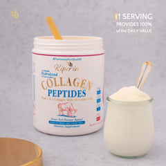 Prepared collagen drink being stirred in a glass