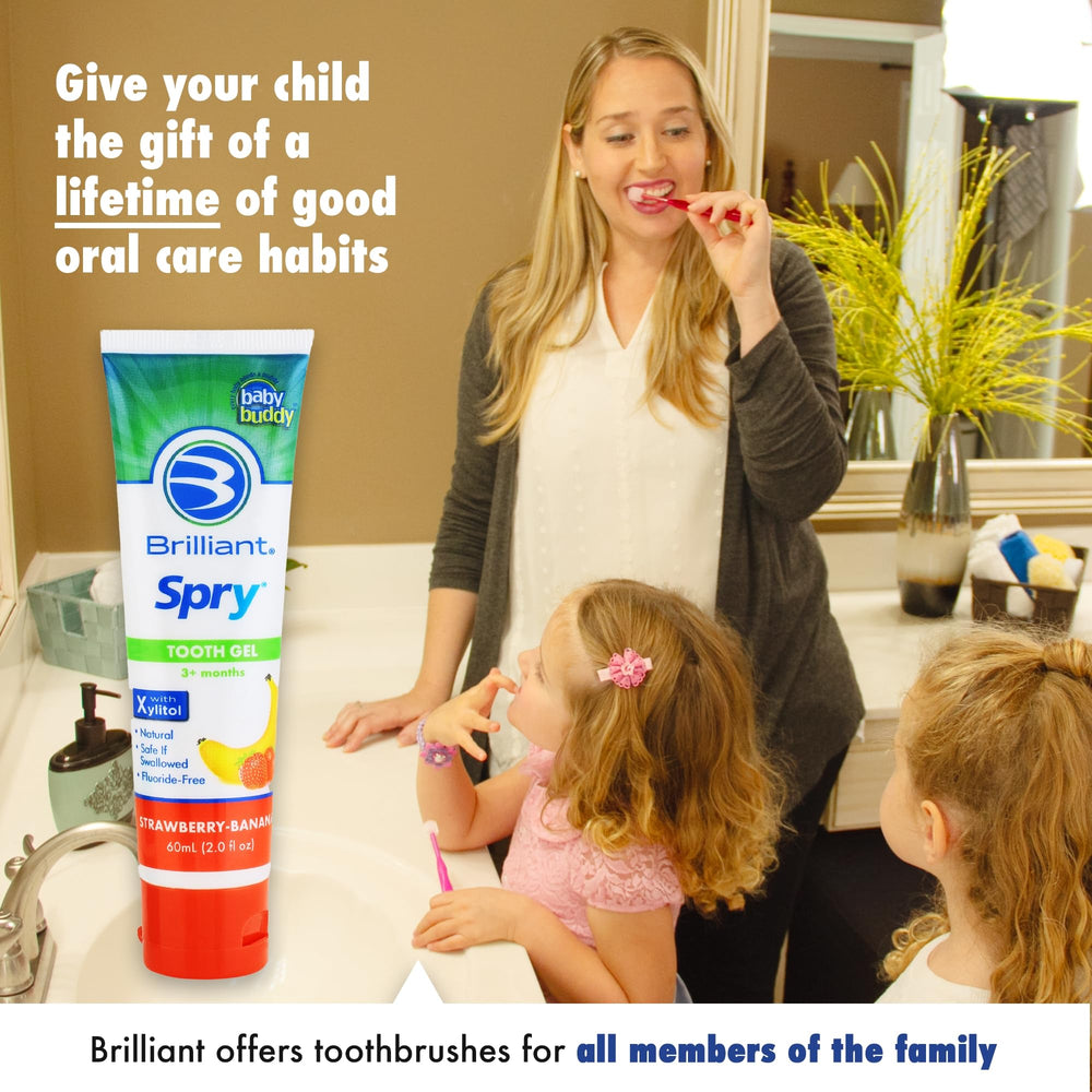 Display of red, purple, and royal colored toothbrushes with toothpaste