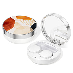Open travel compact contact lens case showing compartments