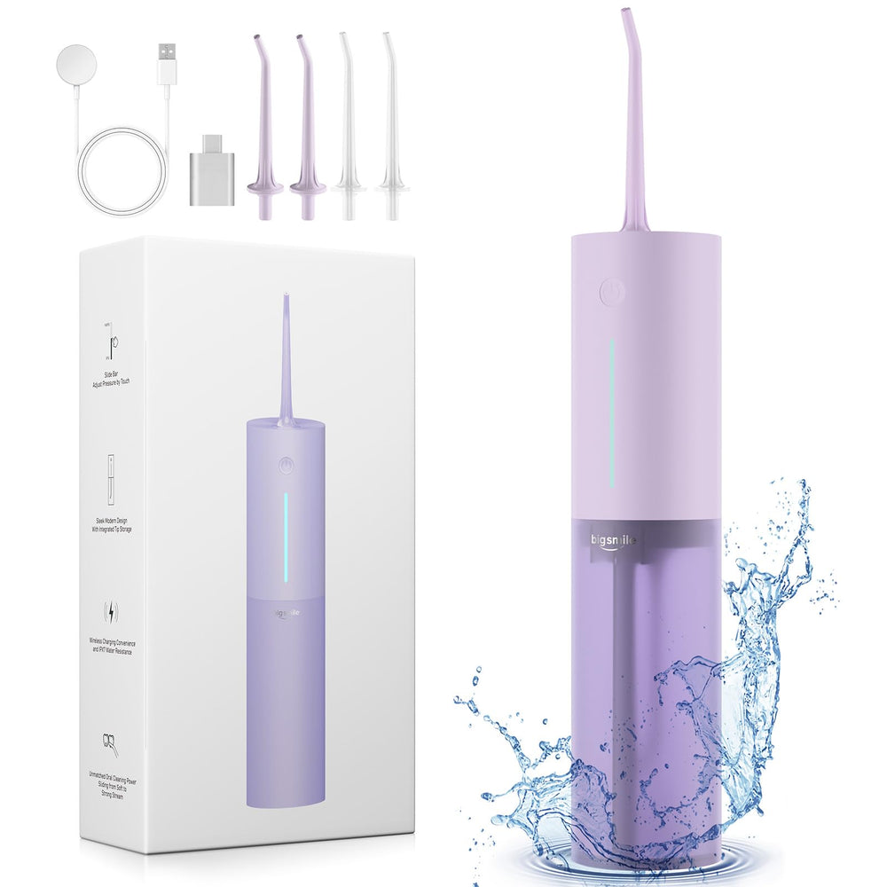 Purple cordless water flosser for travel in compact form