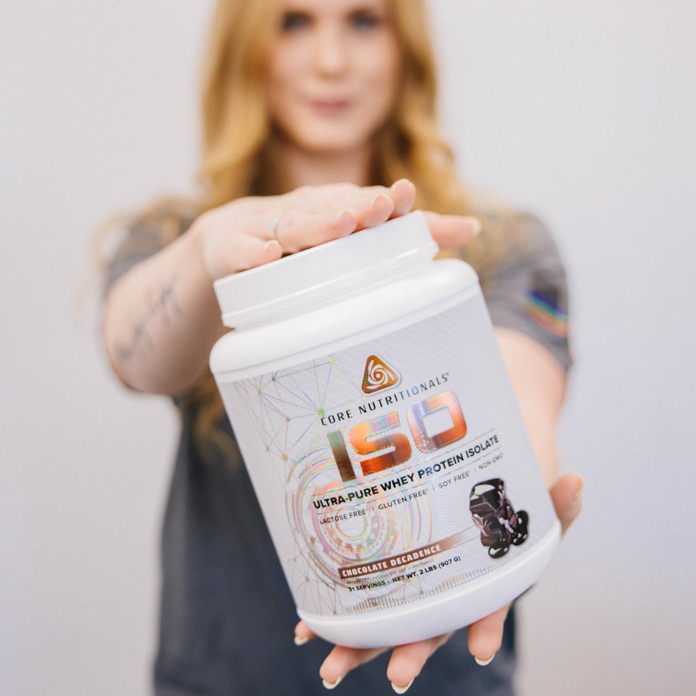 Core Nutritionals Iso Whey scoop dispensing demonstrates easy, measured protein servings