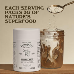 Close-up of Cowboy Colostrum Powder being scooped