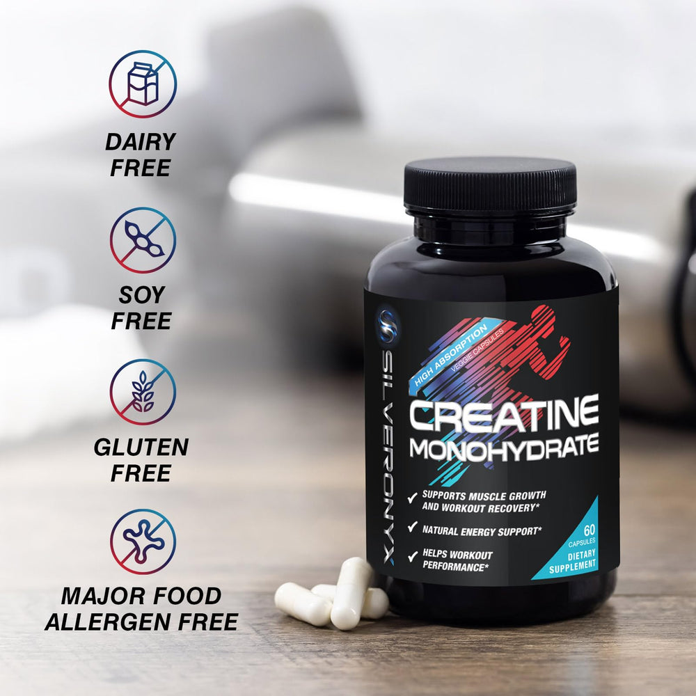 Active individual taking creatine capsules during workout