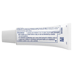 Toothpaste on a toothbrush with minty foam