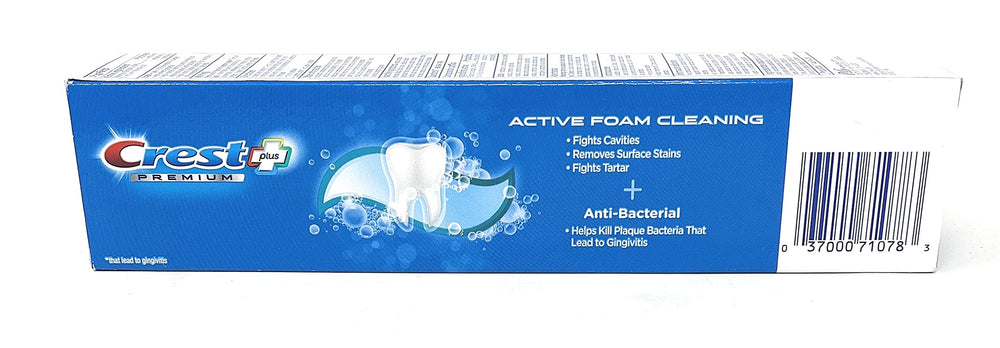 Open Crest Premium Plus 3-pack box with toothpaste tubes visible