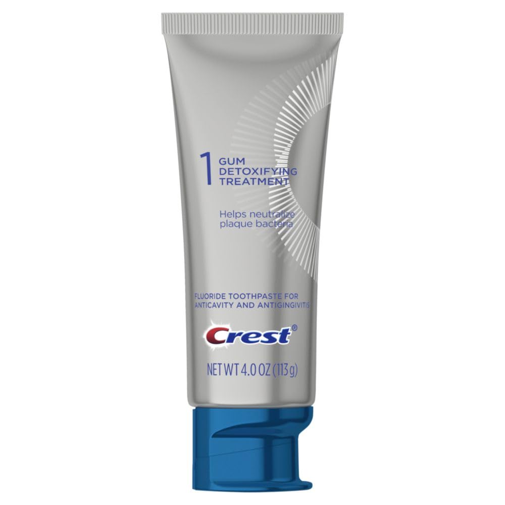 Product in use, toothbrush with Crest toothpaste delivering a refreshing cool sensation