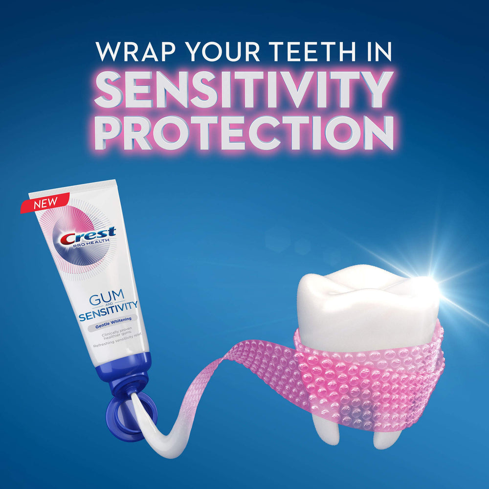 Toothpaste tube being squeezed from the top