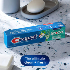 Three Crest + Scope Whitening Toothpaste tubes