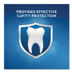 Close-up of Crest toothpaste tube labeled Fluoristat
