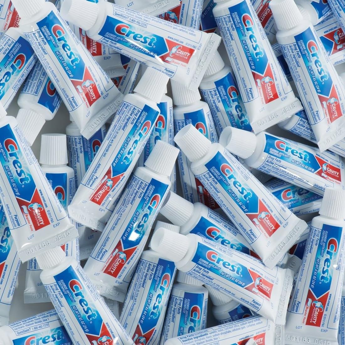 Bulk Crest toothpaste 0.85 oz tubes for hotel amenities