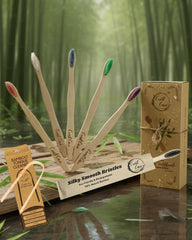 Five Crust Care bamboo toothbrushes with color-coded bristles