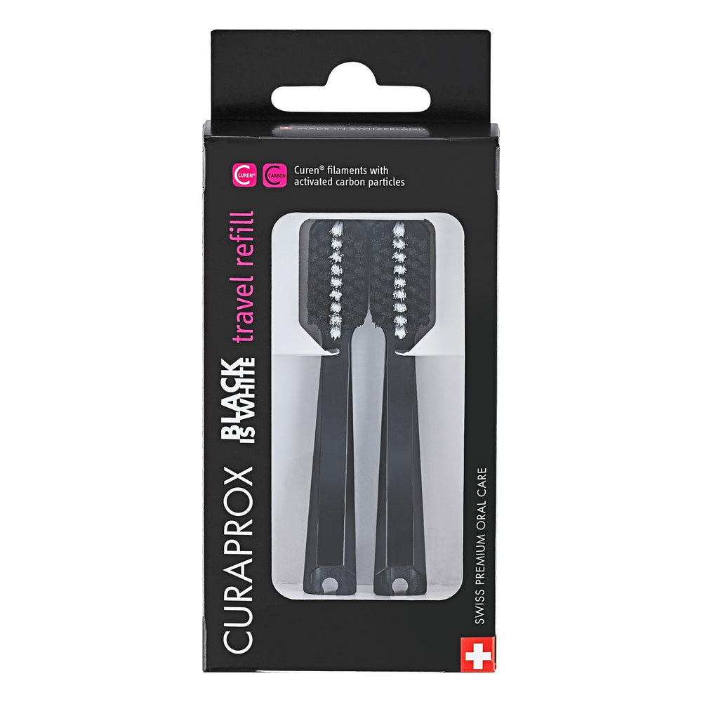 Front view of Curaprox Black is white travel heads refill pack