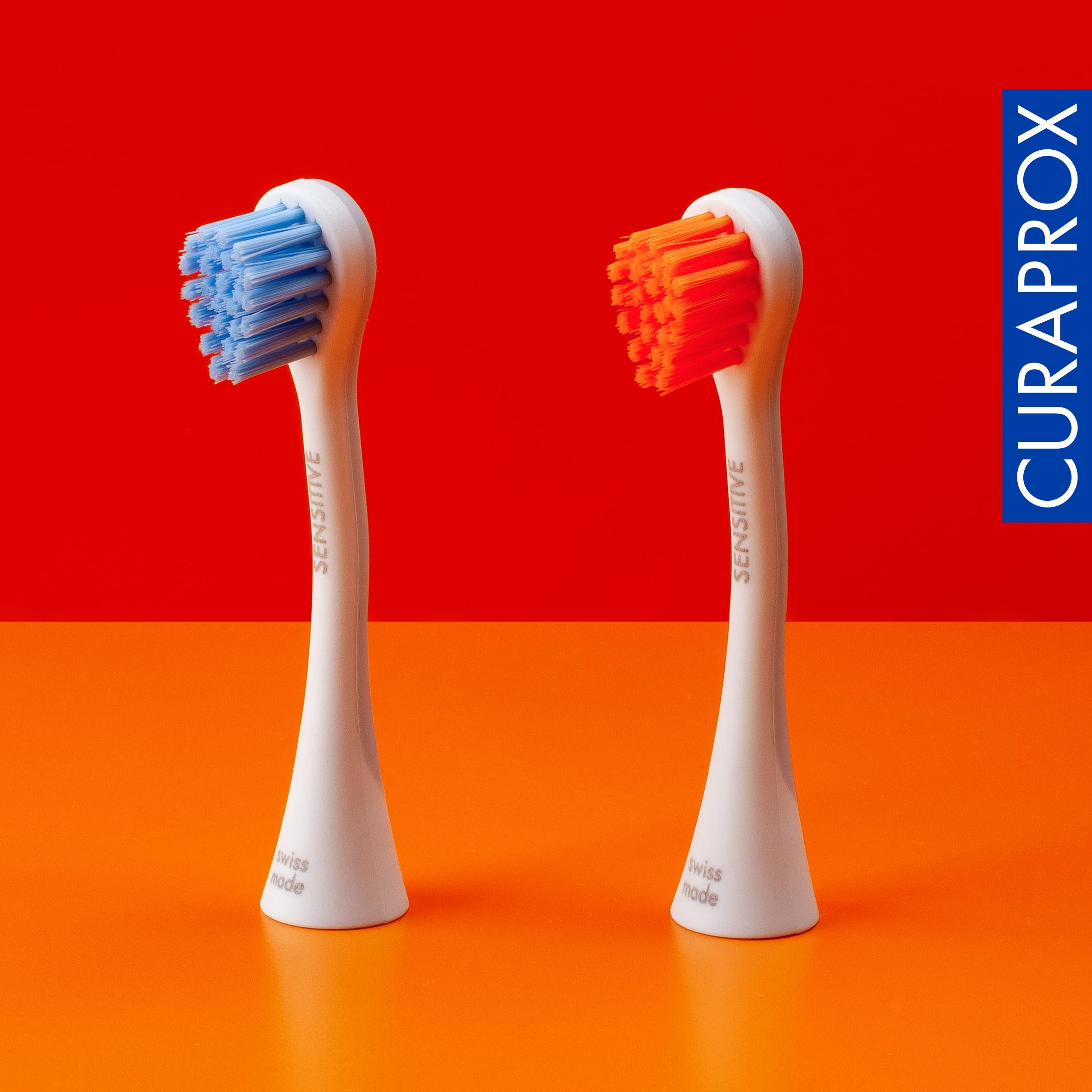 Blue and orange Rainbow Sensitive Duo brush heads color display