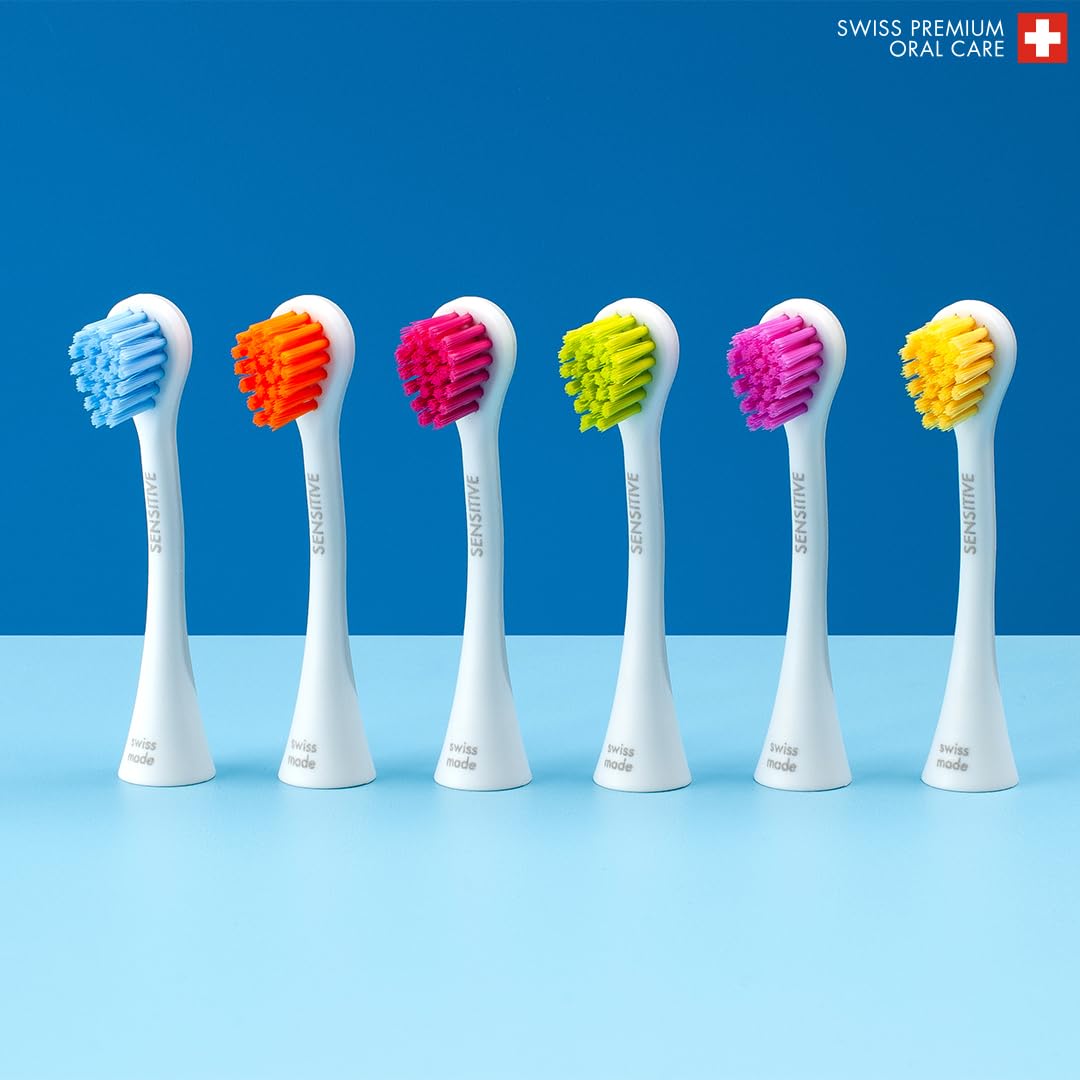 Blue and pink rainbow brush heads in promotional graphic