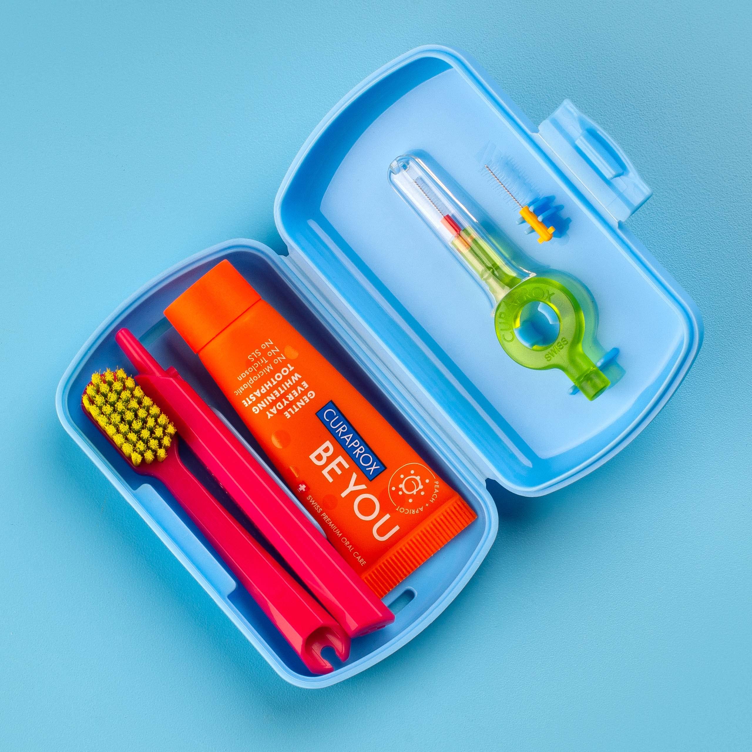 CS 5460 travel toothbrush close-up inside the blue kit