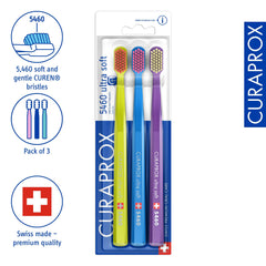 Side view of Curaprox CS 5460 Ultra-Soft Toothbrush blue-purple three-pack