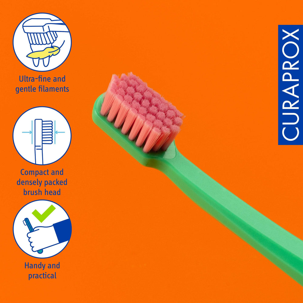 Dense bristle layout for gentle cleaning of teeth and gums