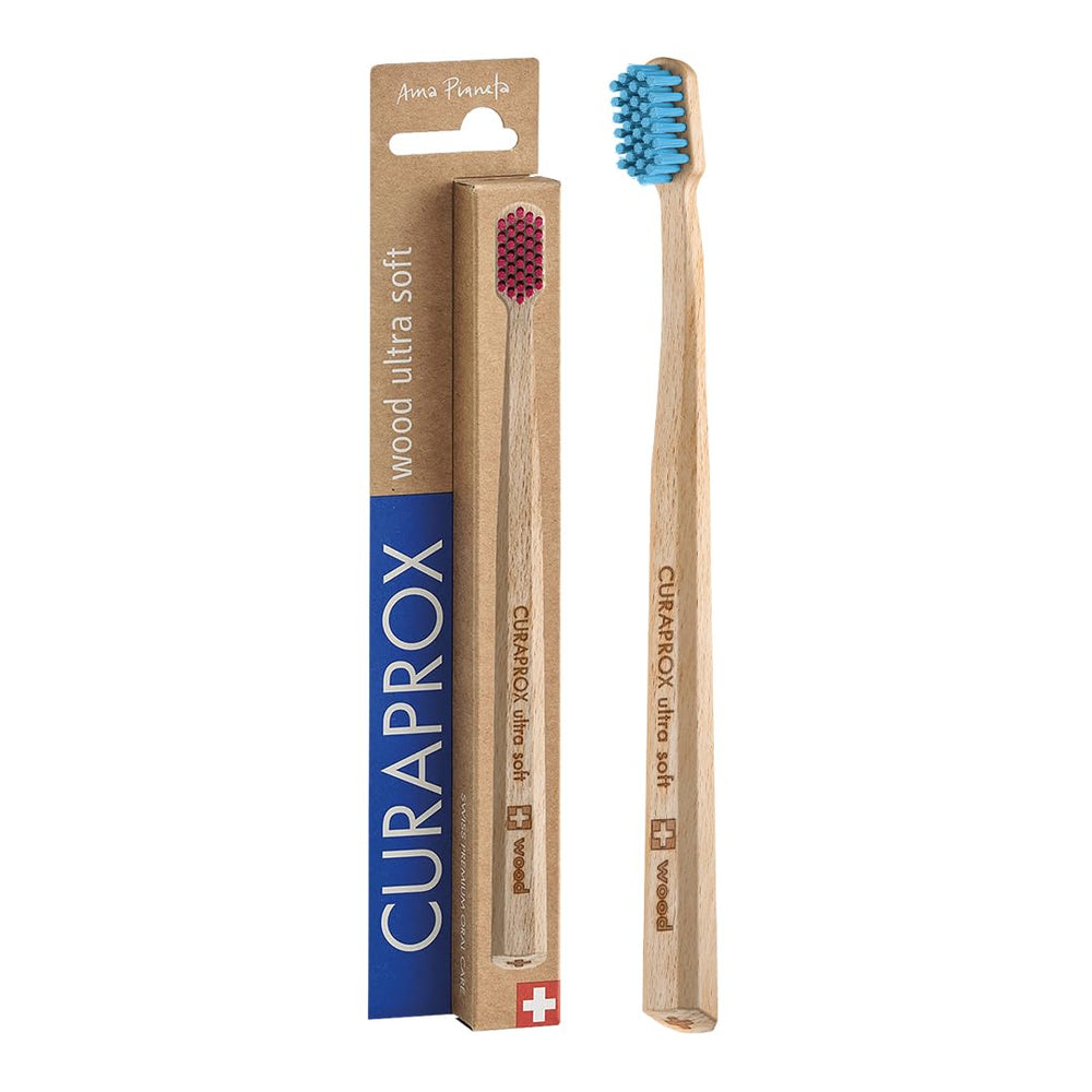 Front view of Curaprox CS Wood Toothbrush with beech wood handle