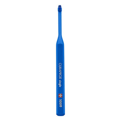 Close-up of Curaprox single-tuft toothbrush head with blue filaments