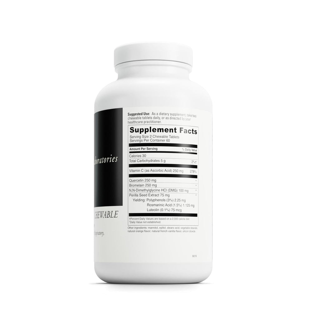 Close-up of orange cream flavored Aller-DMG chewable tablets