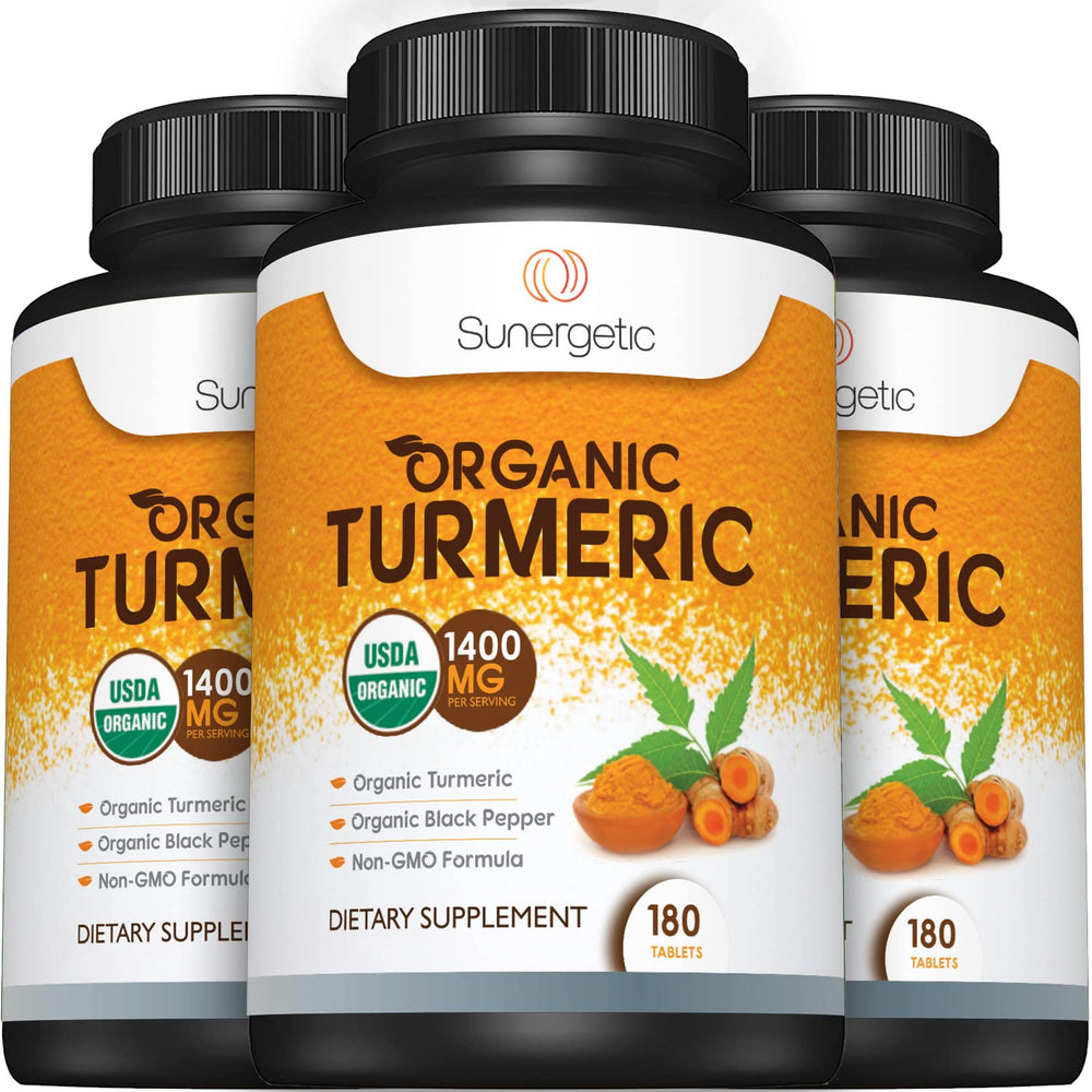 Lifestyle image of a person taking turmeric supplement daily