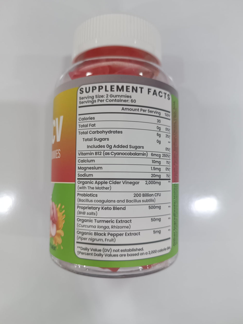 Damicest Apple Cider Vinegar Gummies label showing The Mother and probiotics for gut balance.
