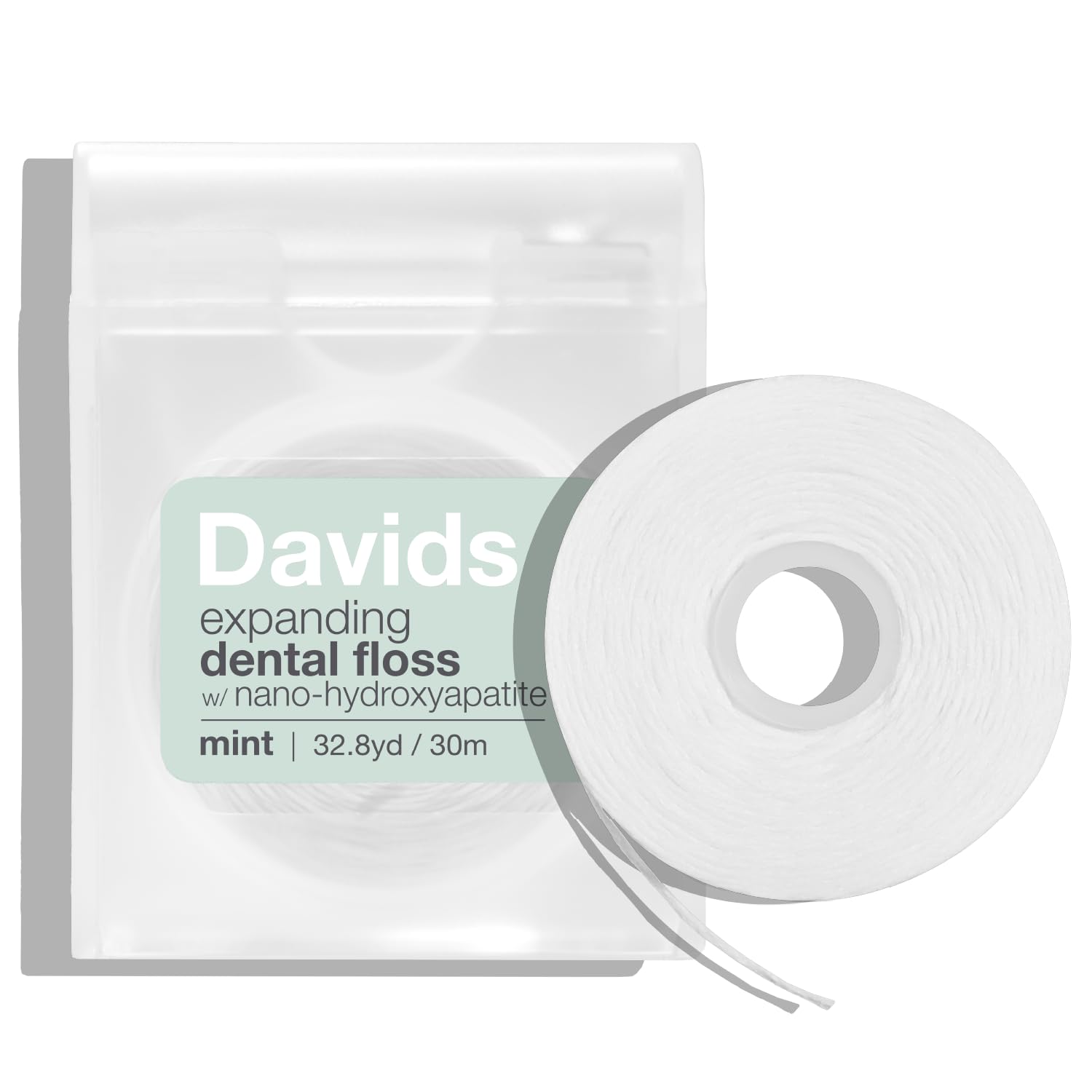 Close-up of Davids expanding dental floss showing tightly woven no-break strands