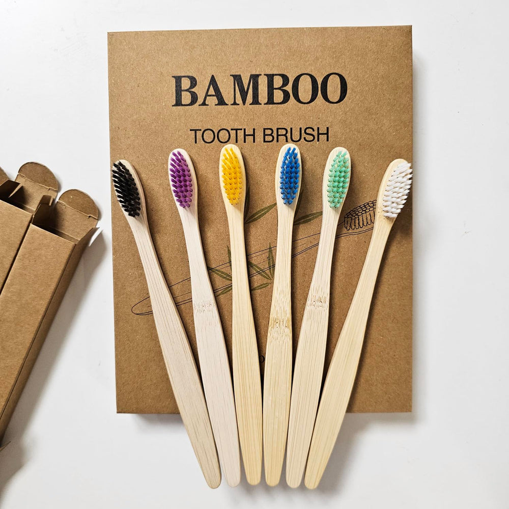 Pack of 24 DDOWA bamboo toothbrushes in recyclable packaging