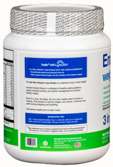 Glass of prepared vanilla shake beside packaging