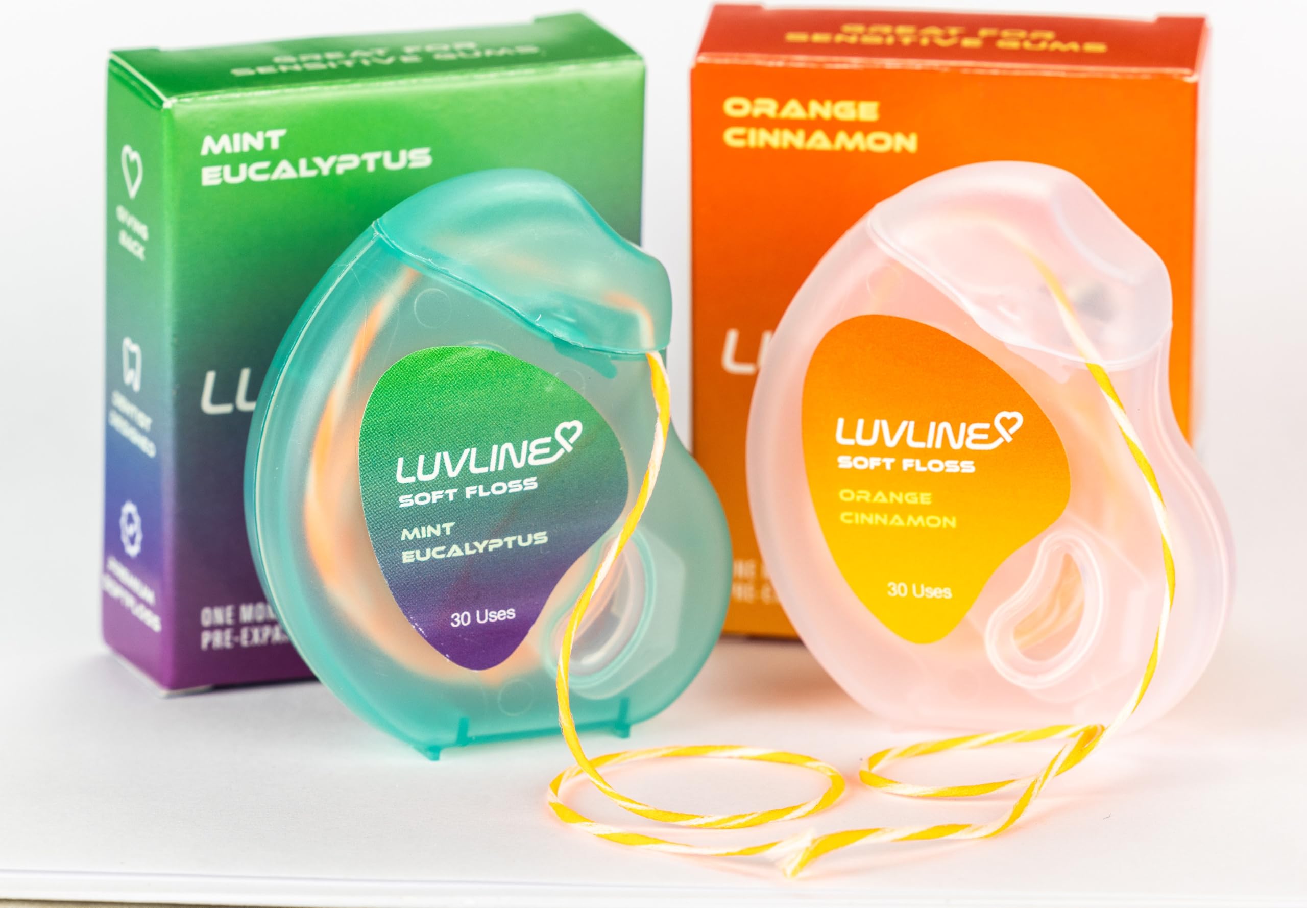Floss strands infused with Hydroxyapatite and Xylitol