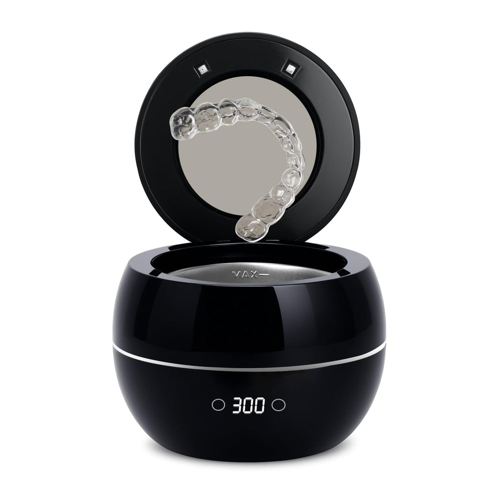Front view of the black dental ultrasonic retainer cleaner