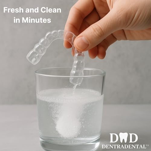 Tablet dissolving in warm water as it begins to fizz for cleaning.
