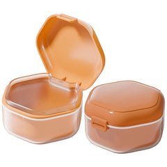 Front view of the orange denture bath box with rounded hexagonal seal