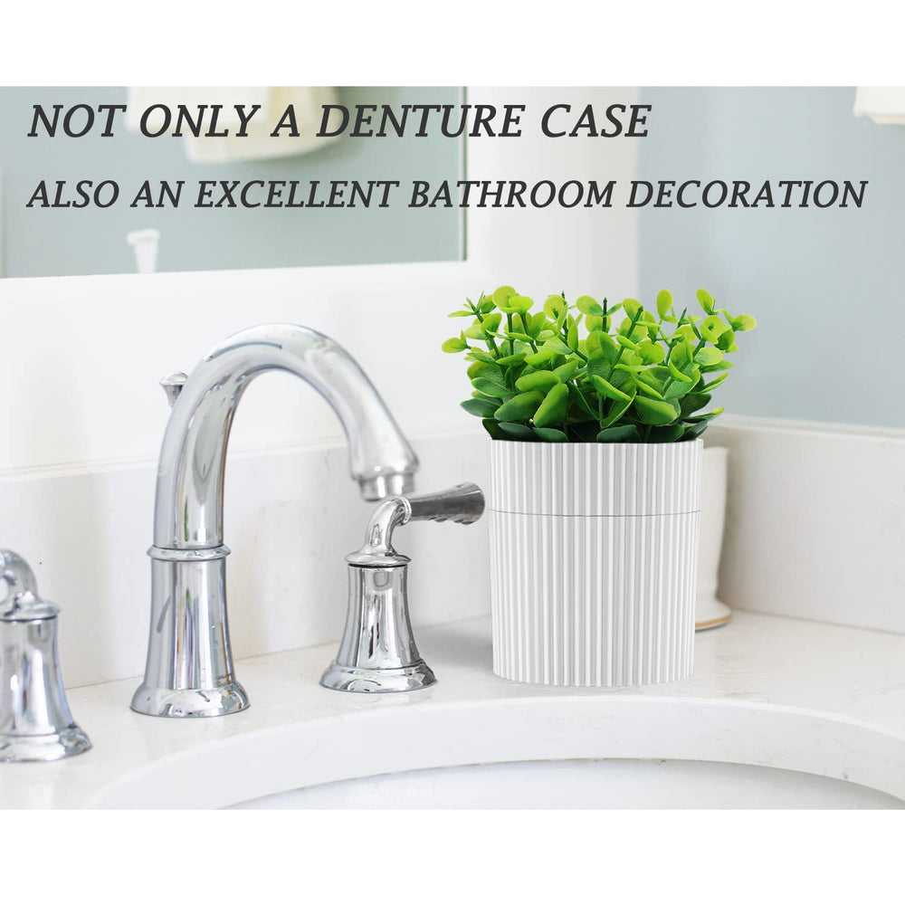 Decorative eucalyptus-inspired denture case on a table