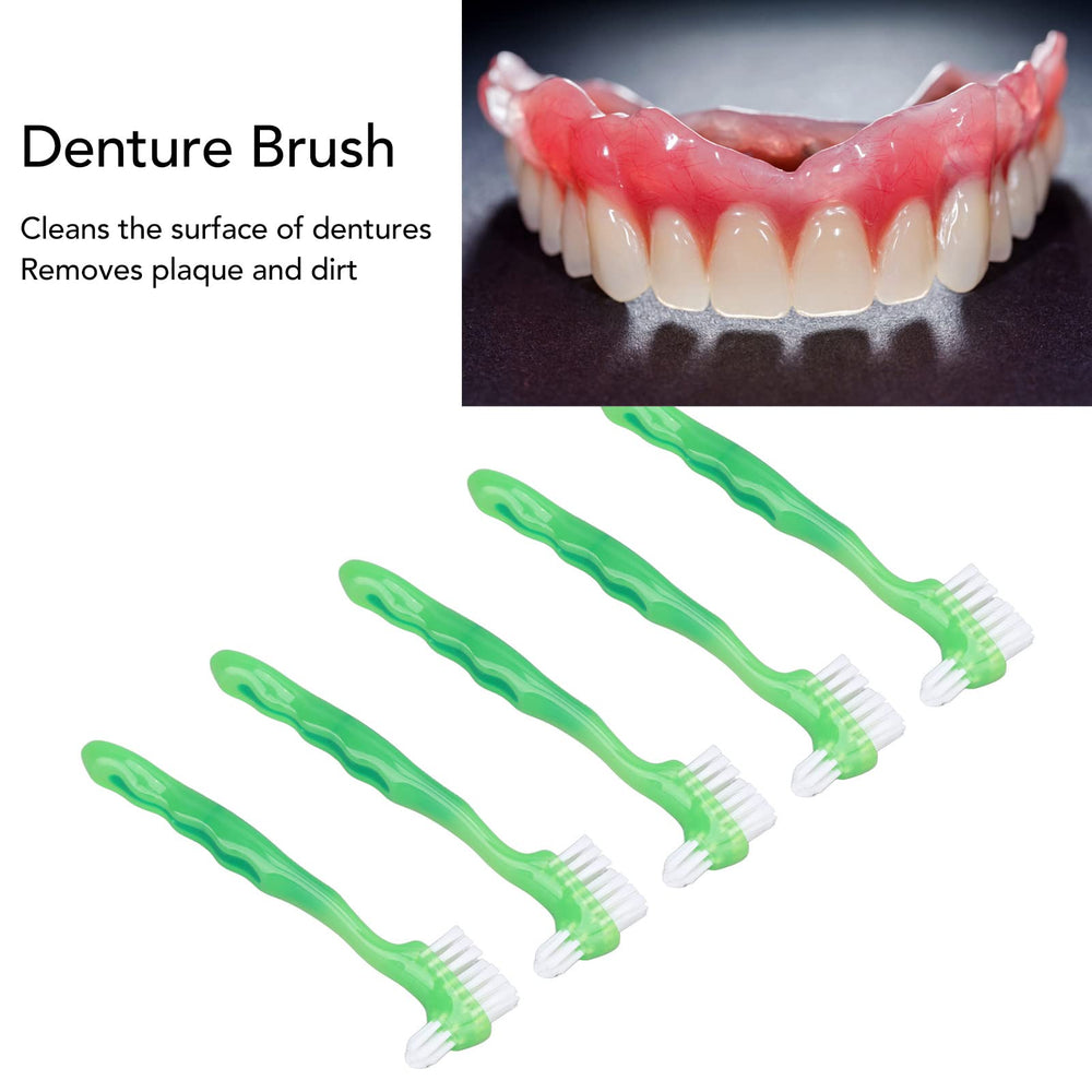 Denture cleaning in progress showing plaque removal