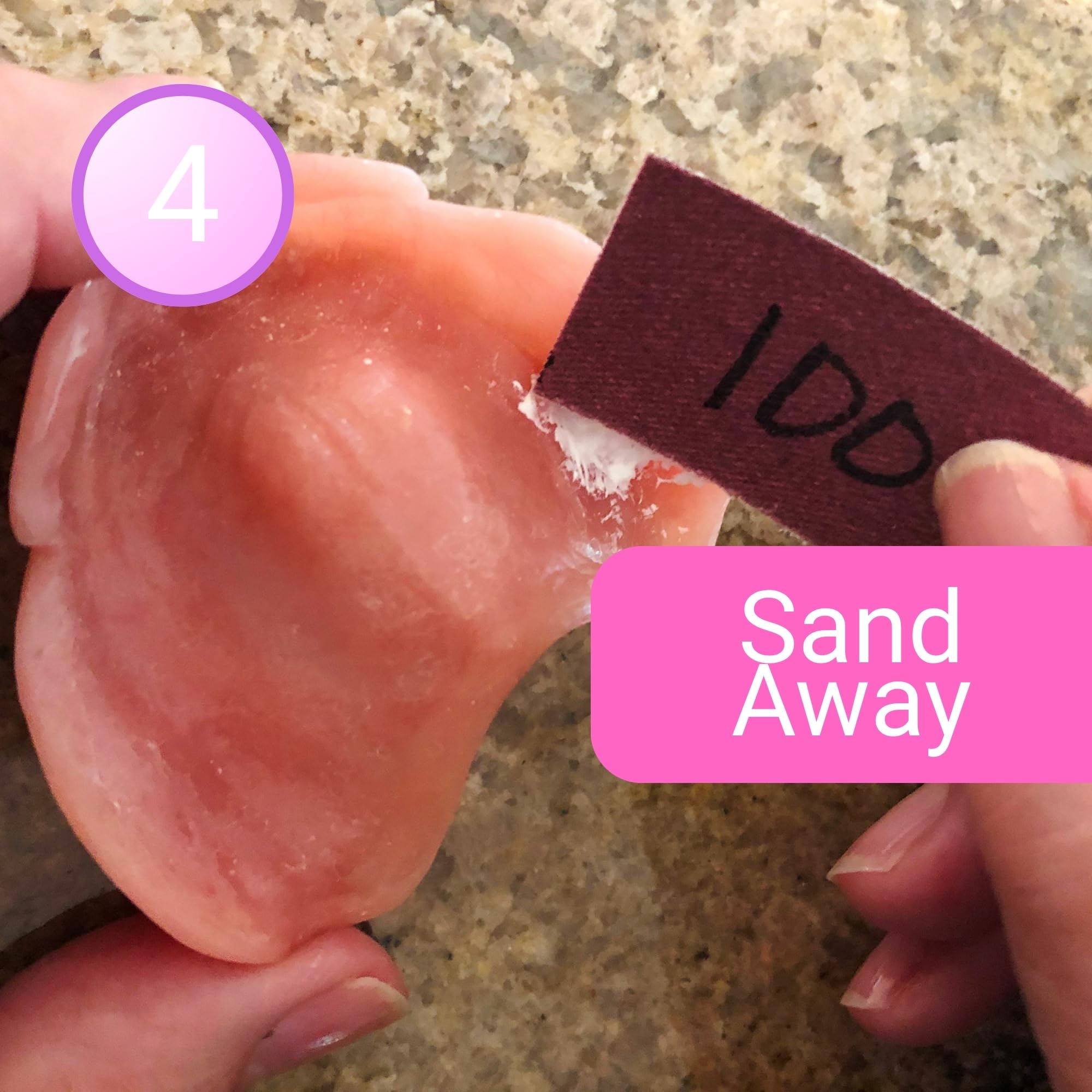 Hands using the kit to locate a sore spot in a denture