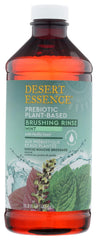 Front view of Desert Essence Prebiotic Mint Brushing Rinse bottle, 15.8 oz