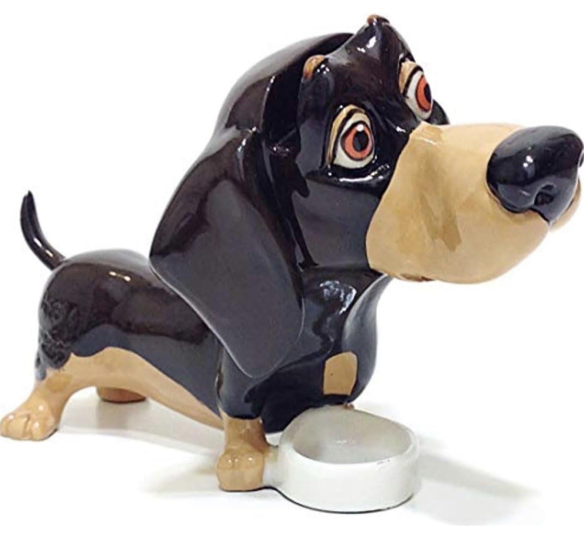 Close-up of heavyweight hand-painted glaze finish on dachshund eyeglass holder stand