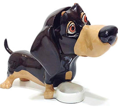 Close-up of heavyweight hand-painted glaze finish on dachshund eyeglass holder stand