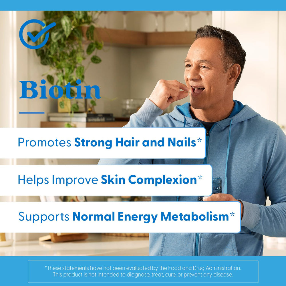 Biotin supplement bottle on a white background