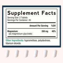 Close-up of magnesium glycinate tablets showing 200 mg per two tablets
