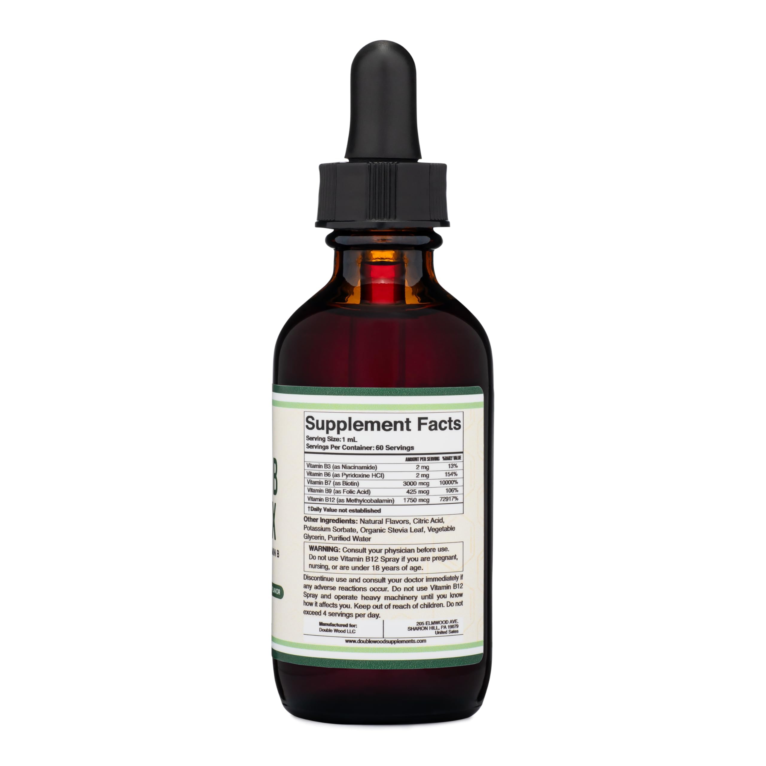 Close-up of Double Wood B Complex liquid bottle label featuring cherry flavor