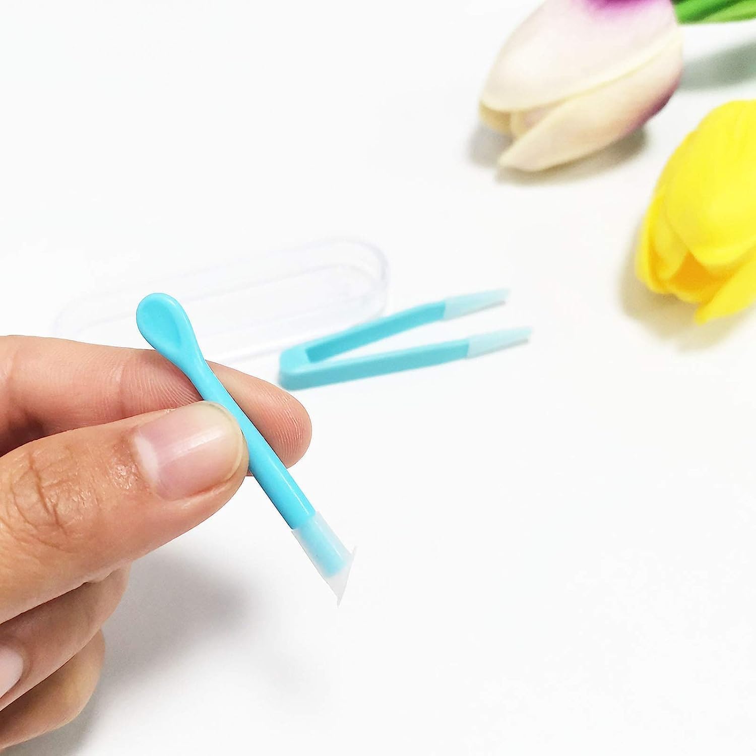 Blue DPWOUM contact lens remover tool