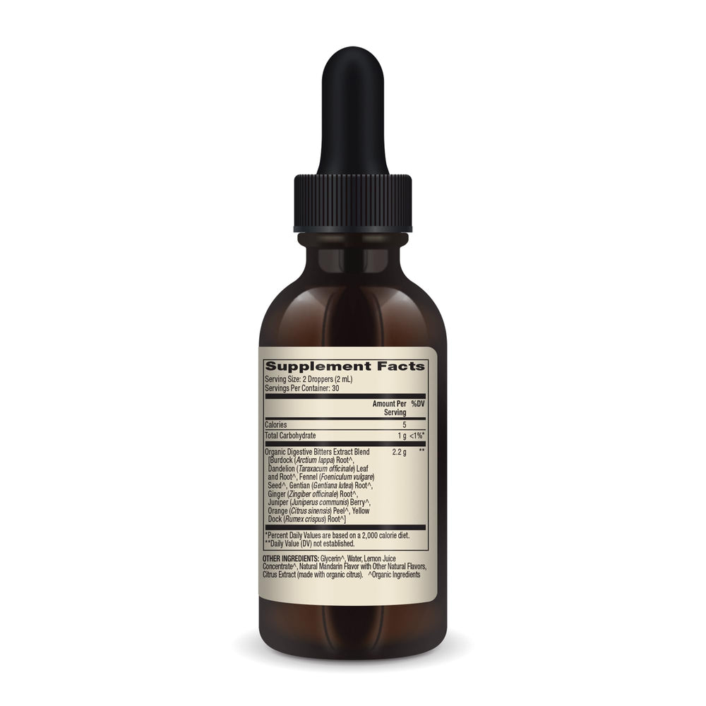 Close-up of bottle with natural herbal ingredients background