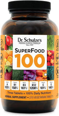 Bottle of Dr. Schulze's SuperFood 100 on white background