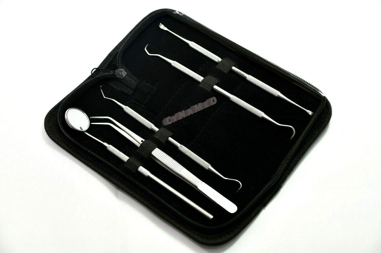 Dual-head scaler and dental pick in use